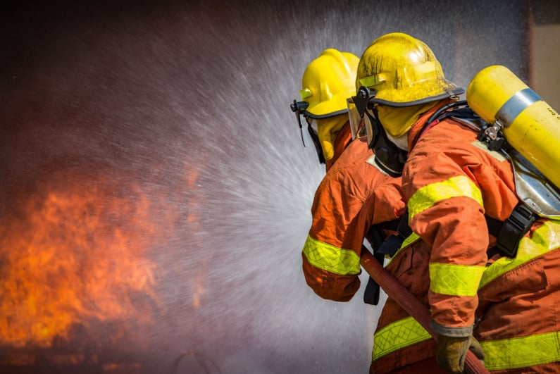 Firefighters fighting a blaze