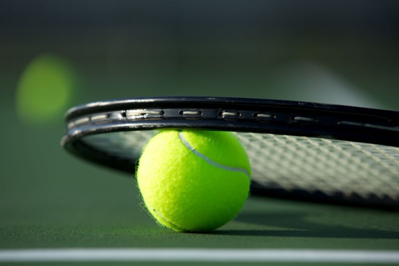 Tennis racket and ball